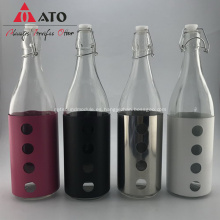 Botella de vidrio con tapa de gran volumen botella de agua de vidrio